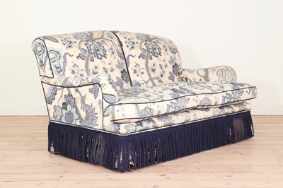 Lot 357 - A two-seater sofa in the manner of Howard & Sons