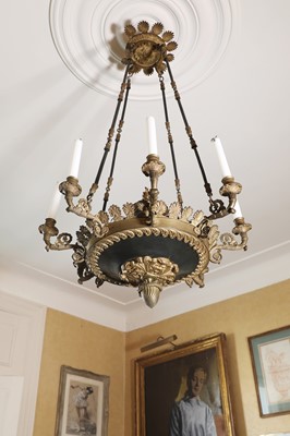 Lot 255 - A Charles X bronze eight-light candle chandelier