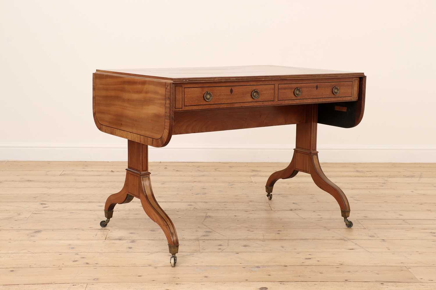 Lot 632 - A Regency strung mahogany sofa table