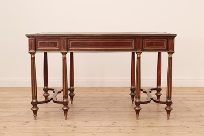 Lot 627 - A Louis XVI-style mahogany bureau plat