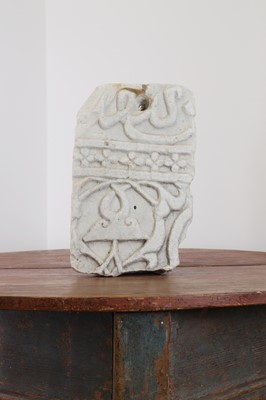 Lot 141 - A carved marble fragment