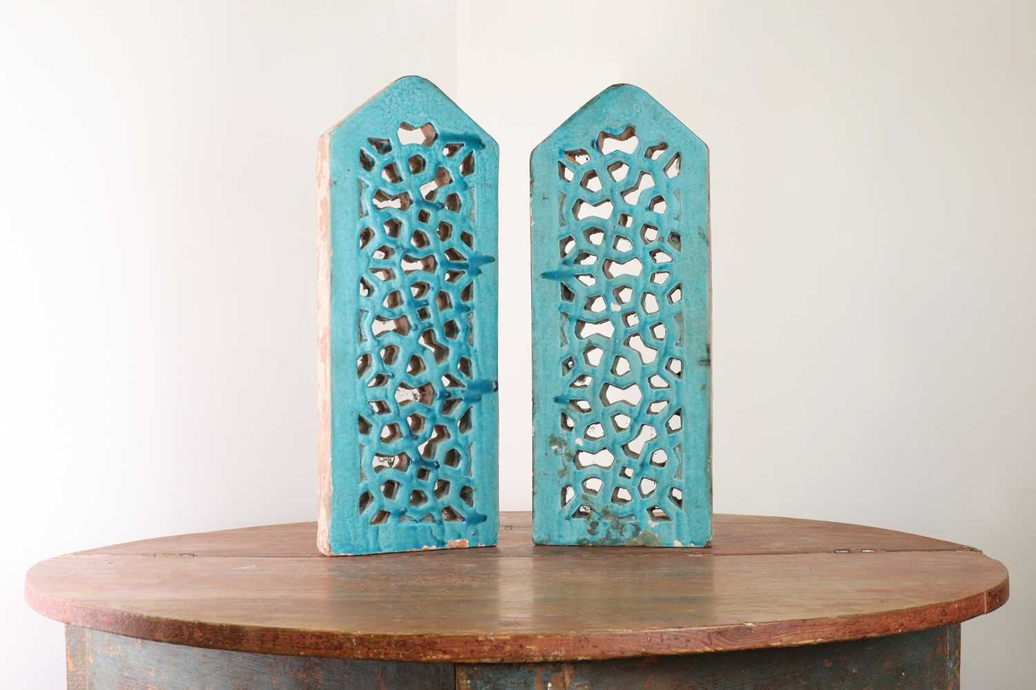 Lot 92 - A pair of Mughal stone jali panels