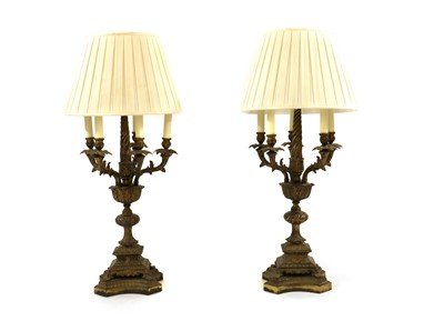 Lot 337 - A pair of cast brass six-light candelabra