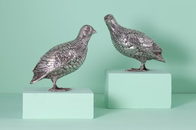 Lot 310 - A pair of silver models of partridges