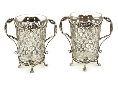 Lot 30 - A pair of pierced Dutch silver glass holders