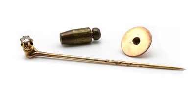 Lot 336 - A cased single stone diamond stick pin