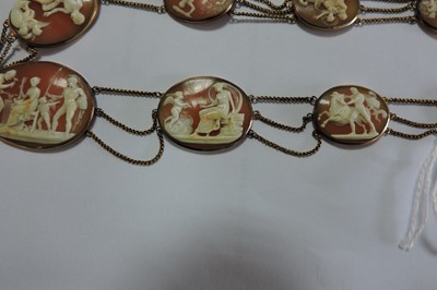 Lot 35 - An early 19th century carved shell cameo necklace and earrings suite