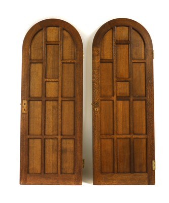 Lot 331 - A pair of oak arched top panelled doors and frames