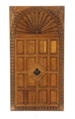 Lot 329 - A carved oak and panelled door