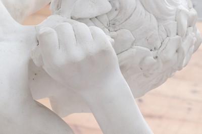 Lot 230 - A marble figure of a crouching faun