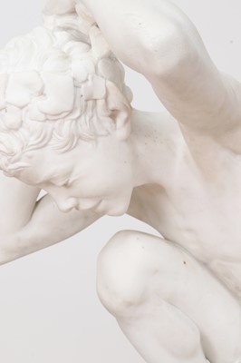 Lot 230 - A marble figure of a crouching faun