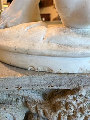 Lot 230 - A marble figure of a crouching faun