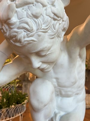 Lot 230 - A marble figure of a crouching faun