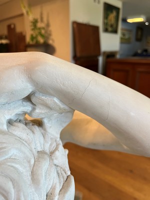 Lot 230 - A marble figure of a crouching faun