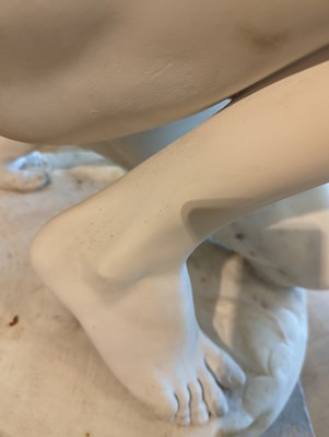 Lot 230 - A marble figure of a crouching faun