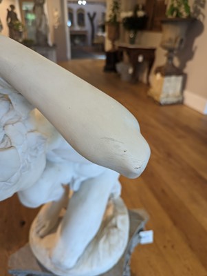 Lot 230 - A marble figure of a crouching faun