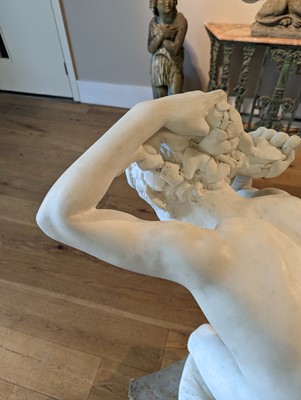Lot 230 - A marble figure of a crouching faun