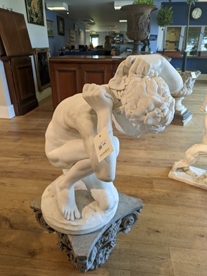 Lot 230 - A marble figure of a crouching faun