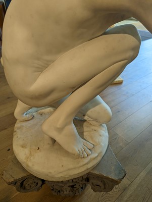 Lot 230 - A marble figure of a crouching faun
