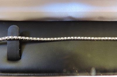 Lot 372 - A single row diamond line bracelet