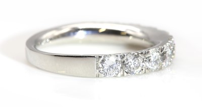 Lot 381 - A diamond set half eternity ring