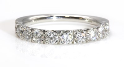 Lot 382 - A diamond set half eternity ring