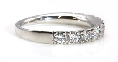 Lot 382 - A diamond set half eternity ring