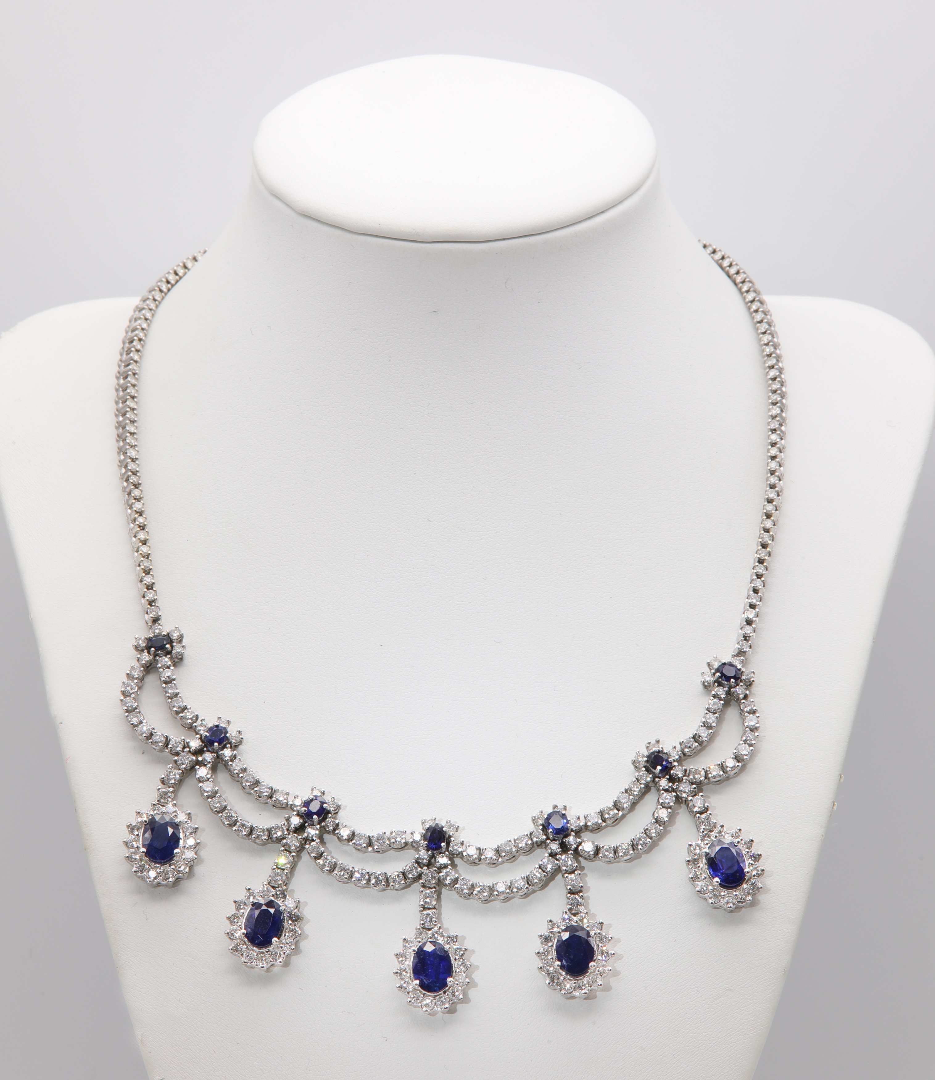 Lot 428 An Italian white gold sapphire and diamond