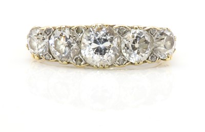 Lot 52 - A late Victorian graduated five stone diamond carved head ring