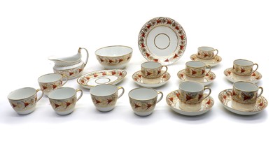 Lot 77 - An English porcelain part tea service