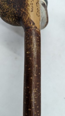 Lot 158 - Three modern carved walking sticks by Sam Wright of Norfolk