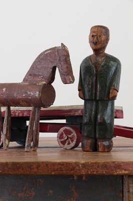 Lot 239 - A folk art carved wooden model of a horse, dray and drayman