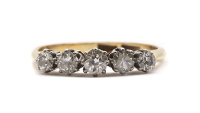 Lot 111 - A gold five stone diamond ring