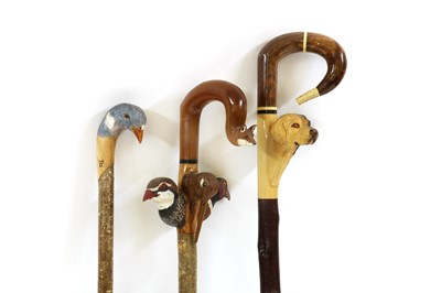 Lot 160 - Three modern carved walking sticks