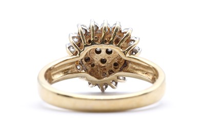 Lot 100 - A 9ct gold heart shaped diamond cluster ring