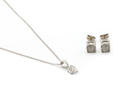 Lot 140 - A white gold single stone diamond pendant