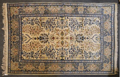 Lot 265 - A Kirman carpet