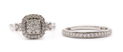 Lot 110 - A 9ct white gold diamond set engagement and wedding ring set