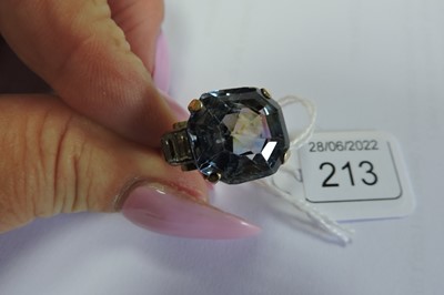 Lot 213 - A single stone sapphire ring with white sapphire set shoulders, c.1940