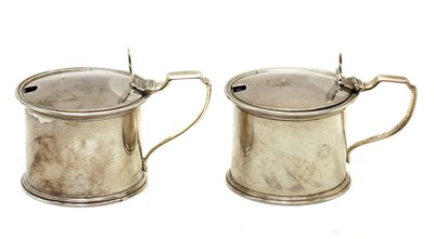 Lot 34 - A pair of George III silver drum mustards pots