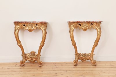 Lot 624 - A pair of carved giltwood pier tables