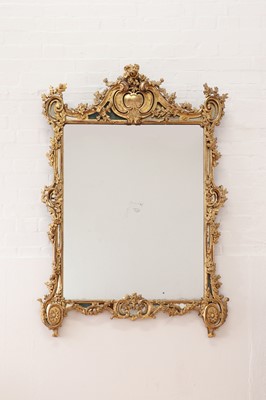 Lot 643 - A giltwood wall mirror