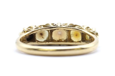 Lot 7 - An Edwardian 18ct gold split pearl and diamond ring