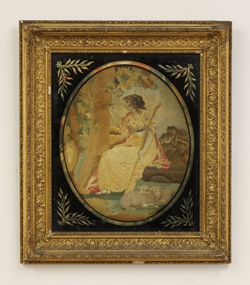 Lot 182 - An oval silkwork picture