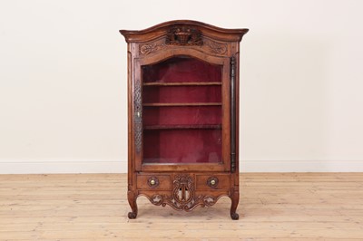 Lot 179 - A French walnut display cabinet