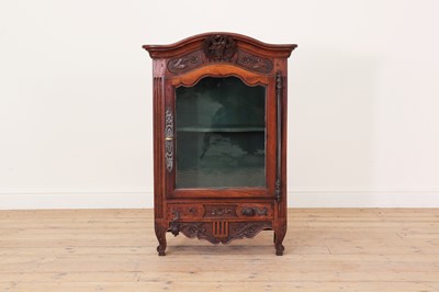 Lot 180 - A French walnut display cabinet