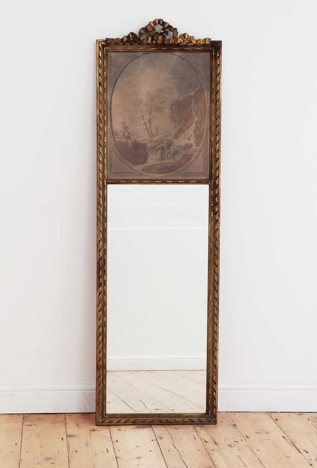 Lot 176 - A carved giltwood wall mirror