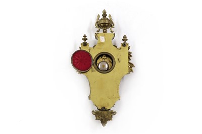 Lot 178 - A brass cartel clock