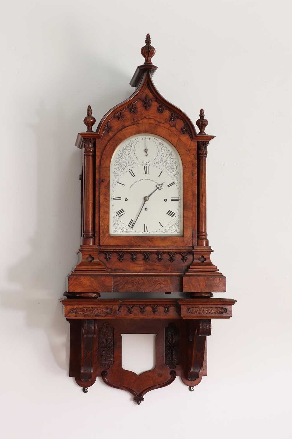 Backat Clock Lot 623 - A Victorian Gothic Revival burr walnut