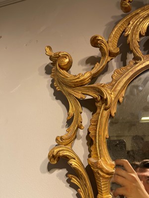 Lot 17 - A George II giltwood mirror